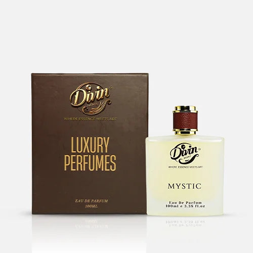 A 100ml bottle of Divin Scent Mystic Eau De Parfum placed beside its brown packaging box labeled “Luxury Perfumes,” featuring gold embossed branding and a minimalist frosted bottle design with a brown leather-textured cap.