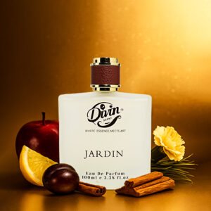 Divin Jardin perfume bottle placed against a golden background with ingredients like apple, orange slice, plum, cinnamon sticks, and a yellow flower symbolizing its fresh and spicy fragrance notes